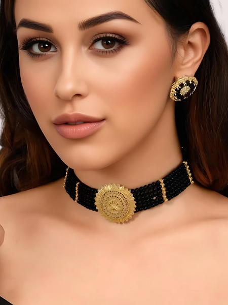 Midnight Majesty Black Beaded Necklace with Ornate Gold Floral Medallion