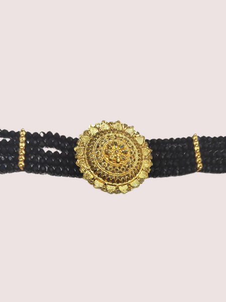 Midnight Majesty Black Beaded Necklace with Ornate Gold Floral Medallion